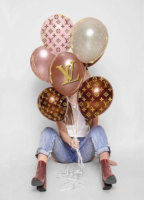 Glasbild mit 60 x 80 cm großen Luftballons aus Goldfolie